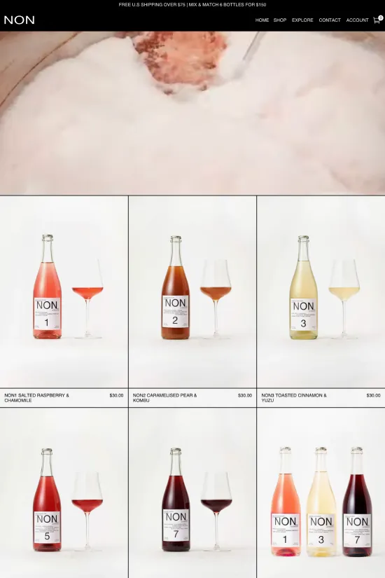 The NON website is a paragon of modern design with its clean lines and minimalistic approach, epitomized by the use of a monochromatic color scheme complemented by touches of muted gold and beige. The use of high contrast between the black text and white background ensures easy readability while drawing the visitor's attention to the elegantly displayed products. Sans-serif typography gives the site a contemporary feel, aligning perfectly with the brand's sophisticated aura. Notably, the website makes skillful use of whitespace, ensuring that each product and accompanying text breathes, further accentuating the overall chic and uncluttered aesthetic. As a beverage company, NON's web presence is distinctly reflective of the premium and artisanal nature of its offerings, inviting potential customers into an immersive brand experience.